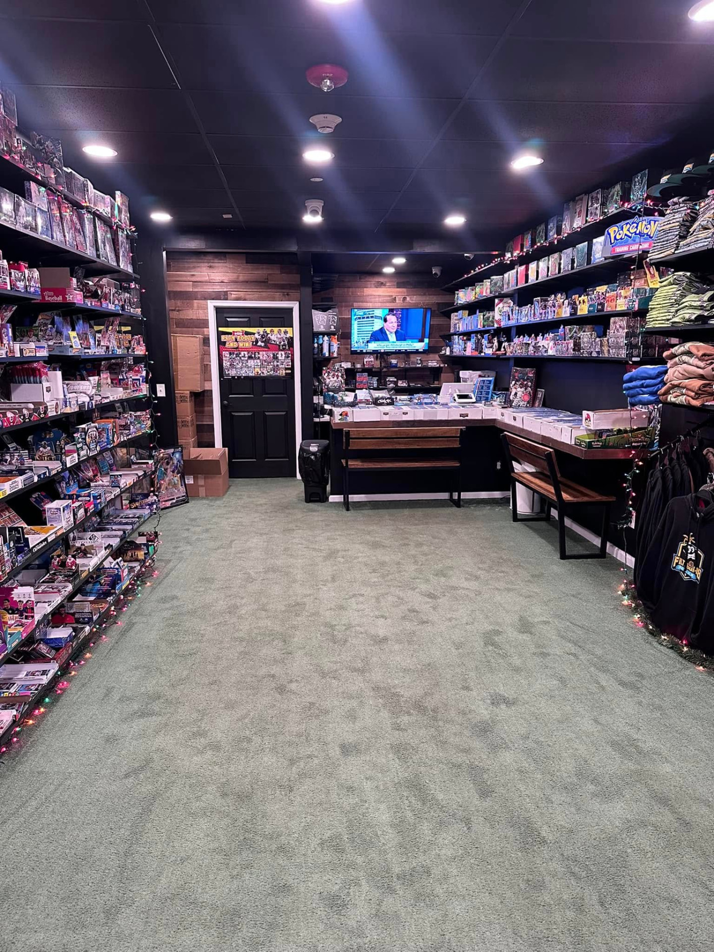 Inside the Filthbomb store, shelves of sports cards and merchandise